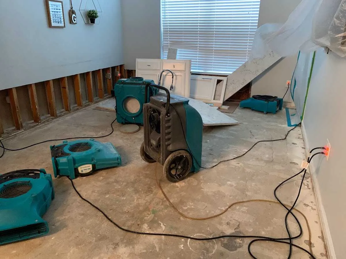 Dehumidifier in flood-cut room for Water Damage Restoration in Bethany